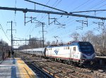 Amtrak Silver Meteor Train # 98 racing past PJC with ACS-64 # 638 in the lead as two other railfans do their thing. 